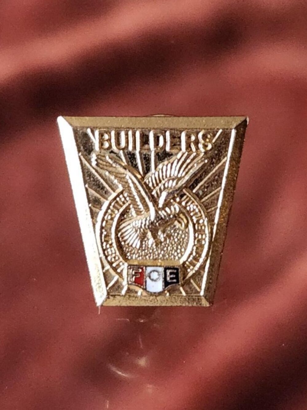 Vintage (FOE) Fraternal Order of Eagles "Builders" lapel pin.